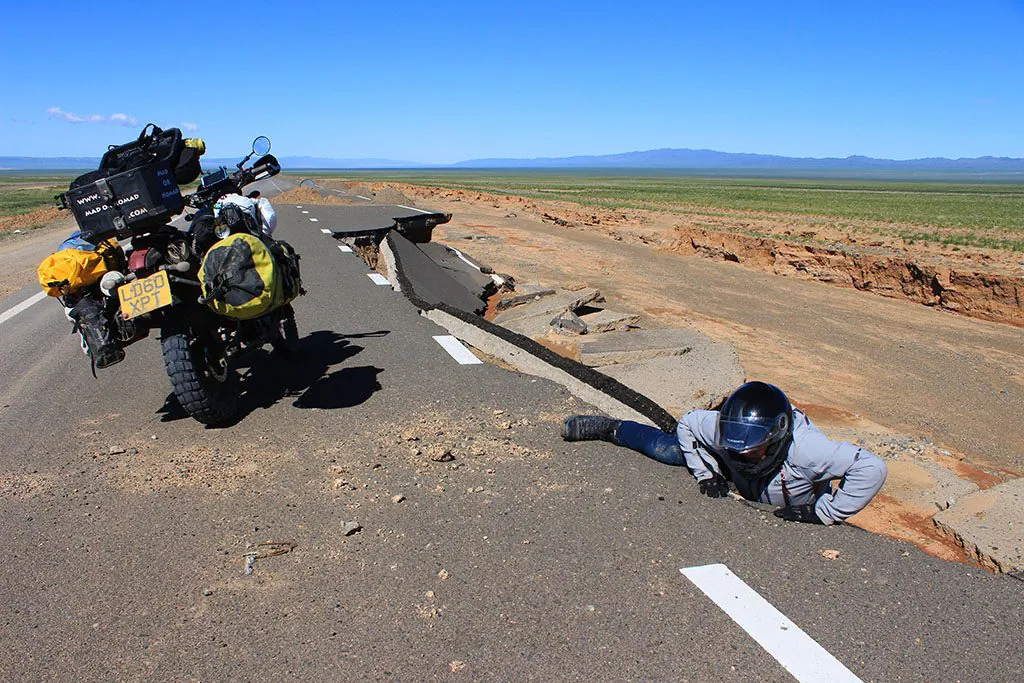 Broken roads in Mongolia on a motorbike