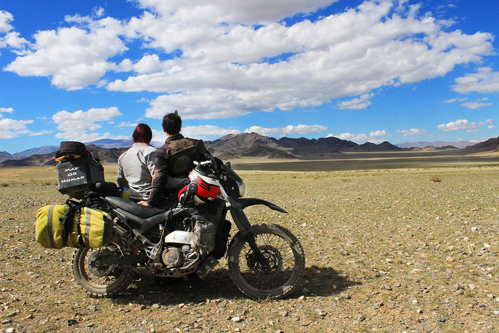 Adventure Motorcycle Travel in Mongolia blue skies