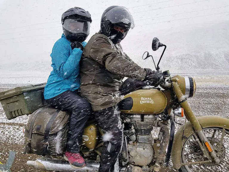Adventure motorcyling with a pillion in the snow