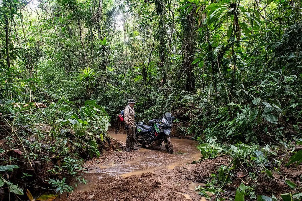 Motorcycle stuck in mud in Darien Gap