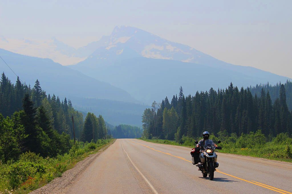 riding a motorbike in canadian rockies