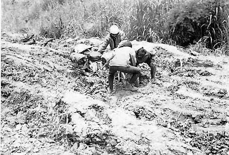 The First Indians to motorcycle round the world on Royal Enfields in deep mud in Central Africa