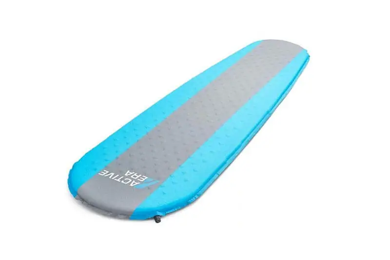 Self inflating mat for motorcycle camping